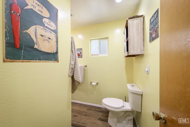 6513 Desmond Ct, Bakersfield, CA 93308 - bathroom featuring toilet and wood finished floors