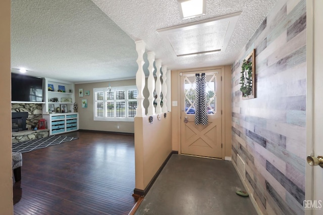 6513 Desmond Ct, Bakersfield, CA 93308 - entrance foyer featuring a textured ceiling and a stone fireplace
