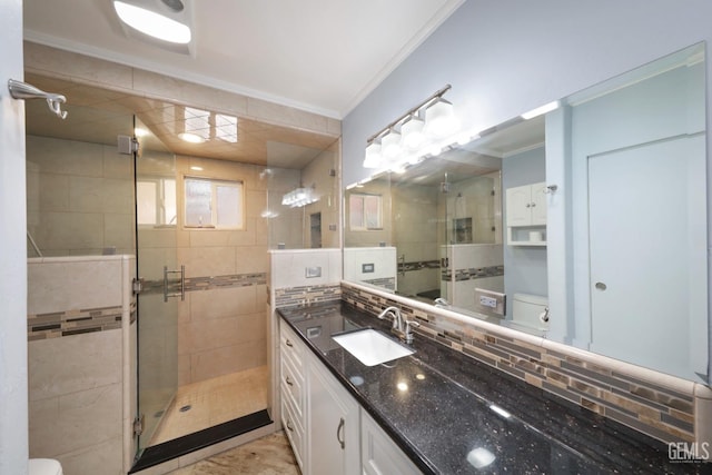 6513 Desmond Ct, Bakersfield, CA 93308 - full bathroom with a shower stall, vanity, ornamental molding, and backsplash