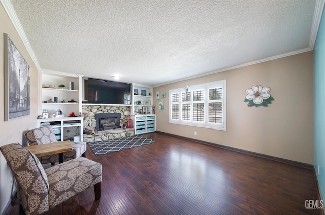 6513 Desmond Ct, Bakersfield, CA 93308 - living room with crown molding, a stone fireplace, a textured ceiling, wood finished floors, and built in features