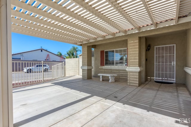 view of patio featuring a pergola