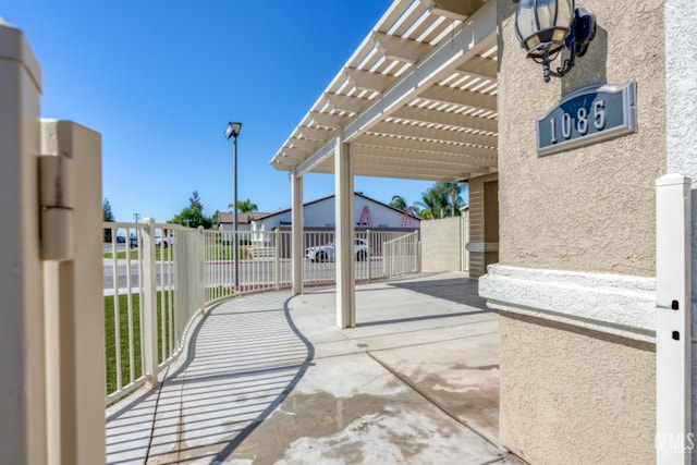 view of patio / terrace featuring a pergola