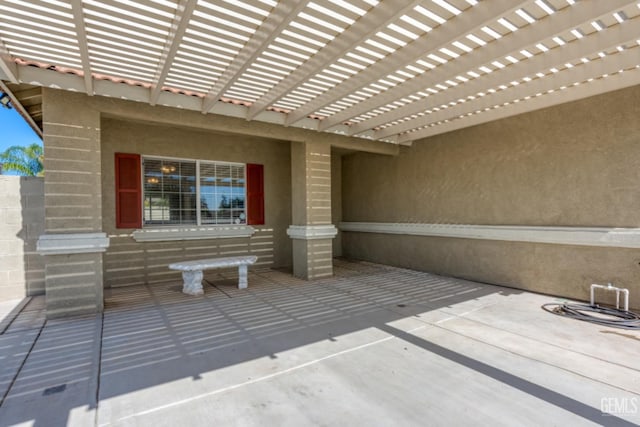 view of patio featuring a pergola