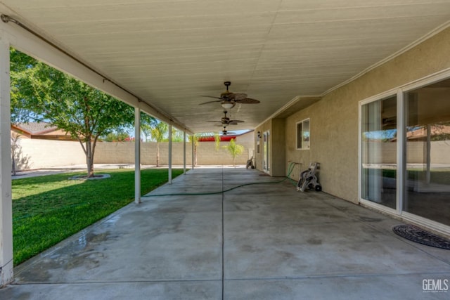 view of patio / terrace featuring ceiling fan