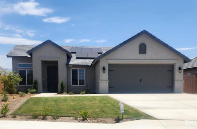 4619 Dry Port Way, Bakersfield, CA 93306 - single story home with stucco siding, an attached garage, roof mounted solar panels, and driveway