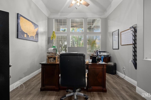 office space featuring wood finished floors, a ceiling fan, and baseboards