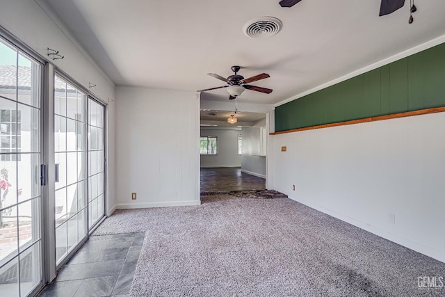 201 Cedar St, Bakersfield, CA 93304 - carpeted spare room with a ceiling fan, crown molding, and baseboards