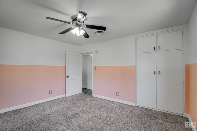201 Cedar St, Bakersfield, CA 93304 - unfurnished bedroom featuring carpet floors, baseboards, a closet, and a ceiling fan