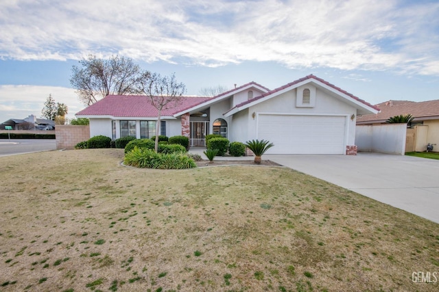 ranch-style house featuring driveway, stucco siding, a tile roof, an attached garage, and a front yard