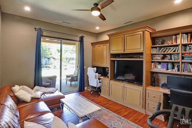 1881 Richert Ave, Clovis, CA 93611 - living area featuring a ceiling fan, built in study area, wood finished floors, and recessed lighting