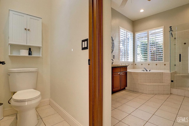 1881 Richert Ave, Clovis, CA 93611 - bathroom featuring tile patterned floors, a garden tub, a shower stall, vanity, and ceiling fan