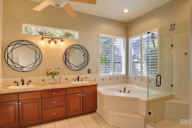 1881 Richert Ave, Clovis, CA 93611 - full bath featuring plenty of natural light, a garden tub, a shower stall, and double vanity