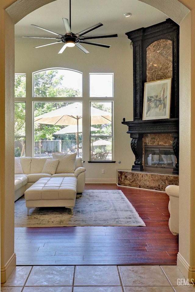 1881 Richert Ave, Clovis, CA 93611 - tiled living room featuring plenty of natural light and ceiling fan