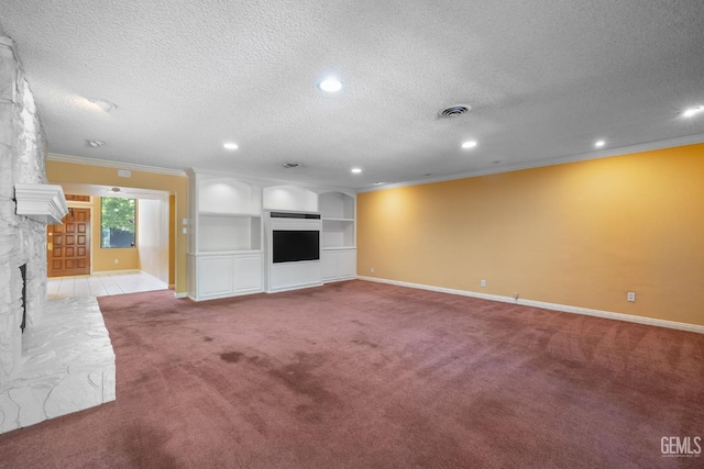 1191 Edmund St, Bakersfield, CA 93309 - unfurnished living room featuring ornamental molding, carpet floors, a textured ceiling, a fireplace, and built in features