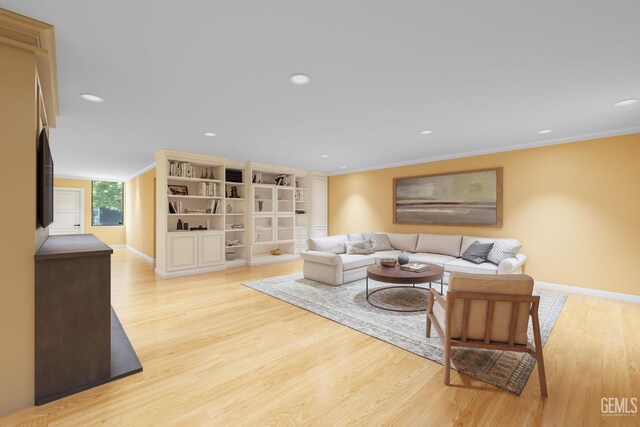 1191 Edmund St, Bakersfield, CA 93309 - living room with wood finished floors, recessed lighting, and ornamental molding