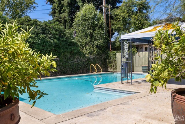 1191 Edmund St, Bakersfield, CA 93309 - view of pool featuring a patio area
