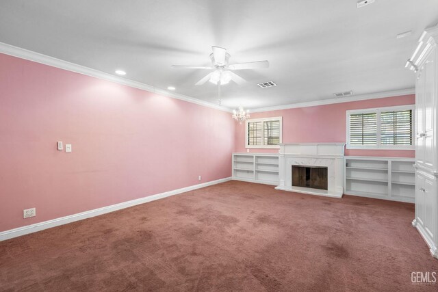 1191 Edmund St, Bakersfield, CA 93309 - unfurnished living room featuring ceiling fan, a premium fireplace, ornamental molding, carpet flooring, and a chandelier