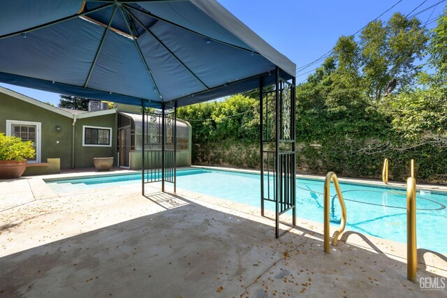 1191 Edmund St, Bakersfield, CA 93309 - outdoor pool featuring a patio area