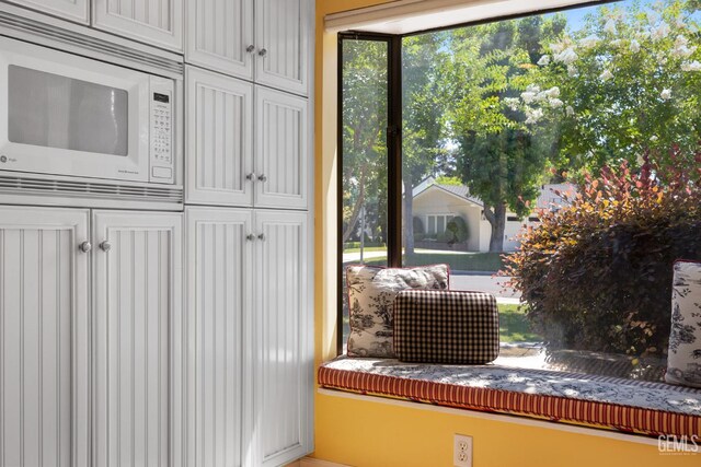 1191 Edmund St, Bakersfield, CA 93309 - kitchen view of white microwave