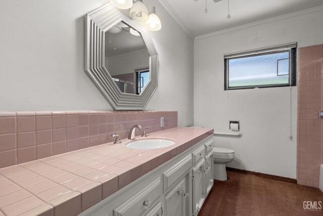 1191 Edmund St, Bakersfield, CA 93309 - full bath featuring vanity, ornamental molding, and backsplash