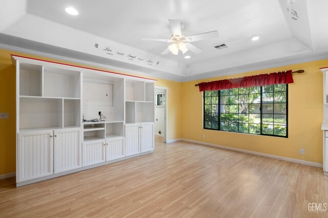 1191 Edmund St, Bakersfield, CA 93309 - empty room with a tray ceiling, a ceiling fan, light wood-style floors, and recessed lighting
