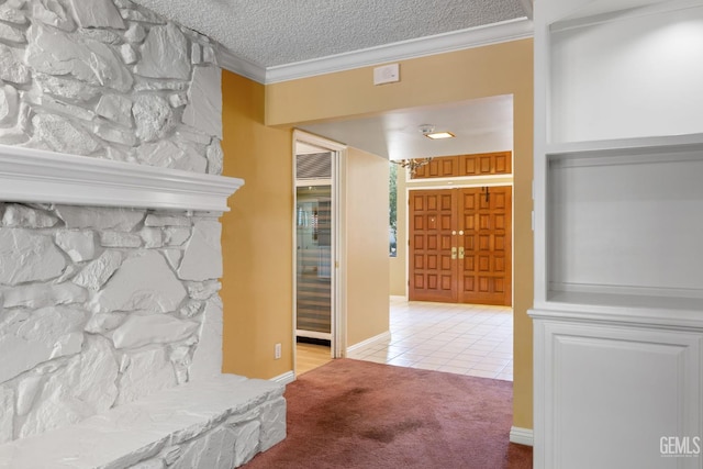 1191 Edmund St, Bakersfield, CA 93309 - corridor with light tile patterned floors, light carpet, crown molding, and a textured ceiling