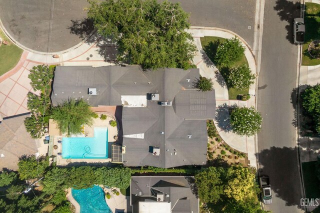 1191 Edmund St, Bakersfield, CA 93309 - drone / aerial view of a pool area