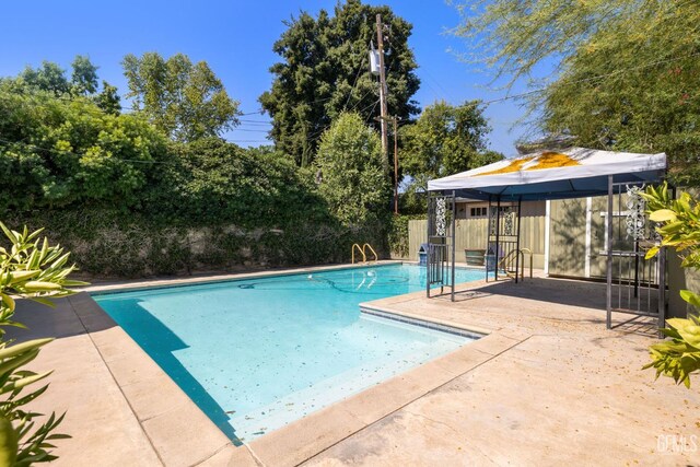 1191 Edmund St, Bakersfield, CA 93309 - view of pool featuring a patio and a gazebo