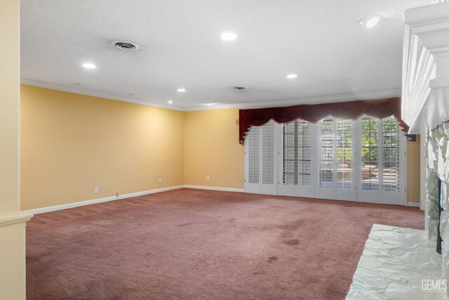 1191 Edmund St, Bakersfield, CA 93309 - empty room featuring carpet flooring, crown molding, recessed lighting, a textured ceiling, and a fireplace