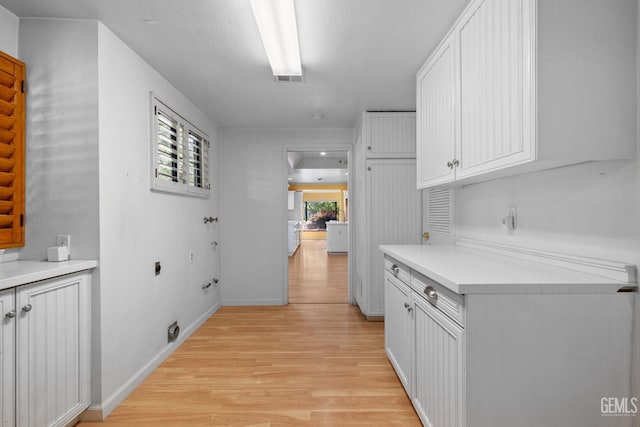 1191 Edmund St, Bakersfield, CA 93309 - corridor featuring light wood finished floors and baseboards