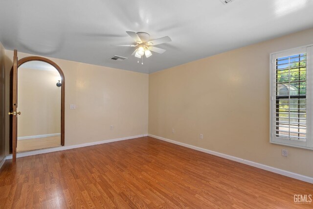 1191 Edmund St, Bakersfield, CA 93309 - unfurnished room featuring light wood-style floors and ceiling fan