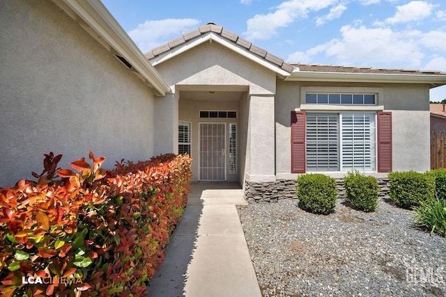 5605 Meadow Valley Ct, Bakersfield, CA 93312 - view of exterior entry with stucco siding