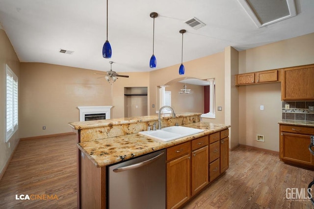 5605 Meadow Valley Ct, Bakersfield, CA 93312 - kitchen featuring stainless steel dishwasher, a sink, ceiling fan, and brown cabinets
