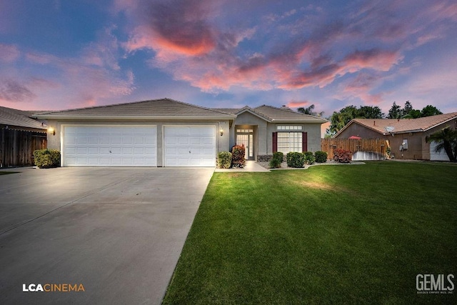 5605 Meadow Valley Ct, Bakersfield, CA 93312 - ranch-style house with concrete driveway, an attached garage, stucco siding, and a tile roof