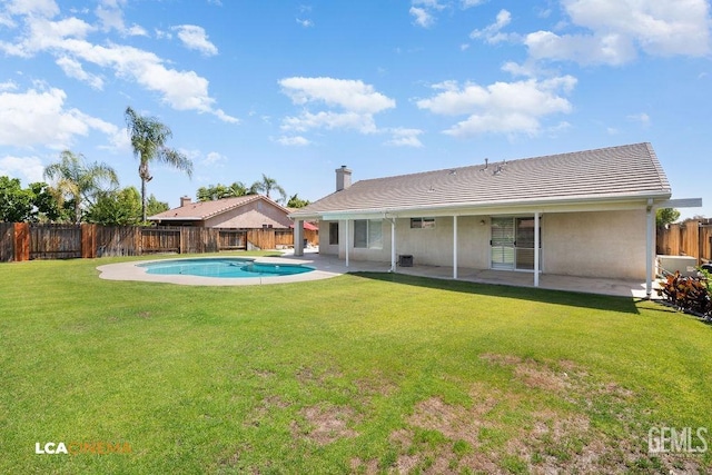 5605 Meadow Valley Ct, Bakersfield, CA 93312 - rear view of house with a patio, a tile roof, stucco siding, and a chimney