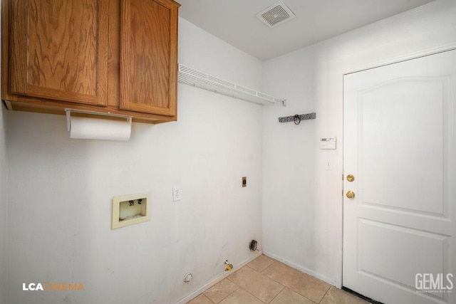 5605 Meadow Valley Ct, Bakersfield, CA 93312 - washroom featuring hookup for a washing machine, cabinet space, gas dryer hookup, electric dryer hookup, and light tile patterned flooring