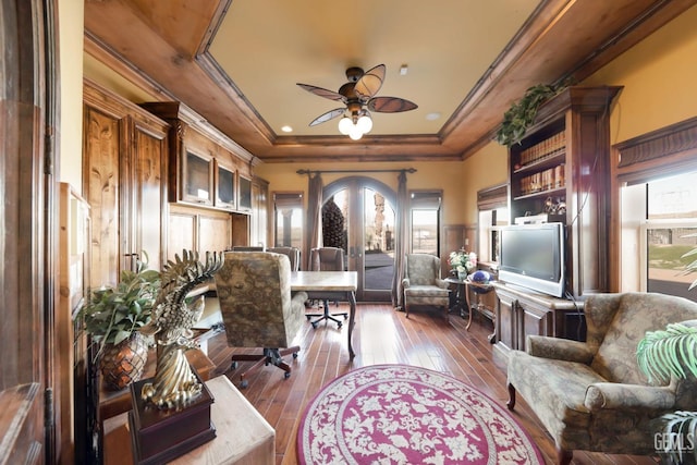 office with ceiling fan, a wealth of natural light, crown molding, and hardwood / wood-style flooring