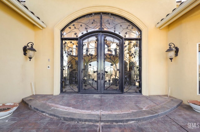 property entrance with french doors