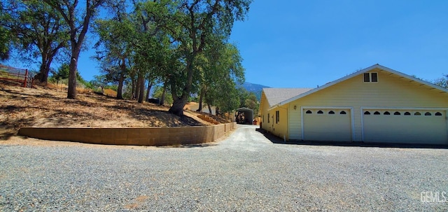 view of home's exterior featuring a garage