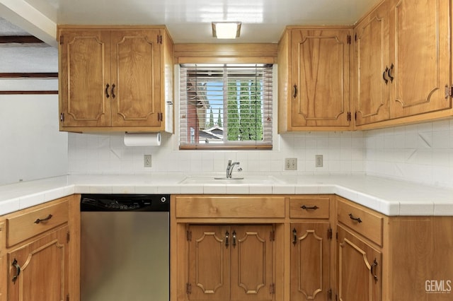 700 Mulberry St, Tehachapi, CA 93561 - kitchen featuring dishwasher, tasteful backsplash, and light countertops