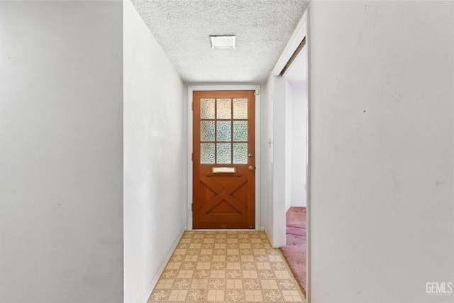 700 Mulberry St, Tehachapi, CA 93561 - entryway with light floors and a textured ceiling