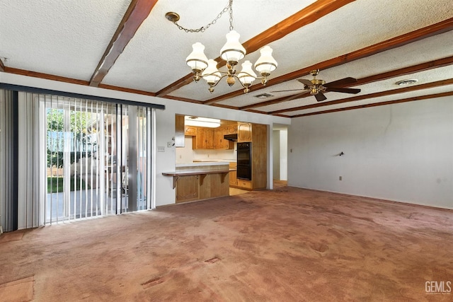 700 Mulberry St, Tehachapi, CA 93561 - unfurnished living room featuring beam ceiling, a chandelier, a textured ceiling, light colored carpet, and a ceiling fan