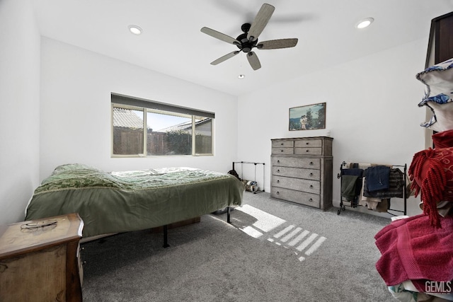 bedroom featuring a ceiling fan, recessed lighting, and light colored carpet