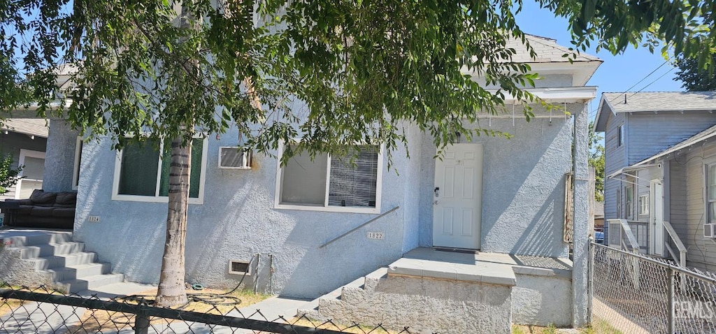 1822 Maple St, Bakersfield, CA 93304 - view of front facade featuring stucco siding