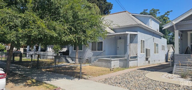 1822 Maple St, Bakersfield, CA 93304 - view of front facade featuring stucco siding