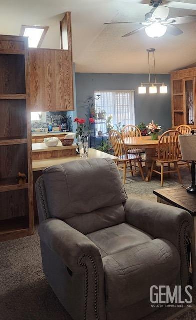 living room featuring ceiling fan