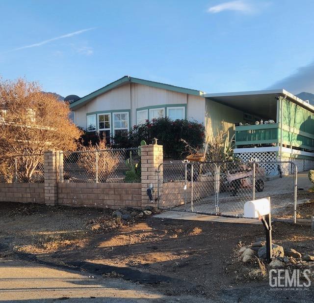 view of front of house featuring a carport