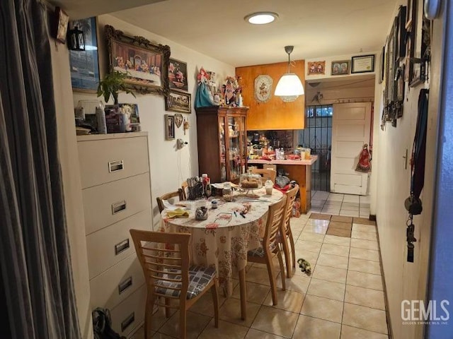 view of tiled dining space