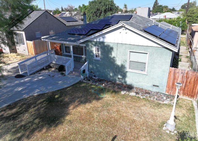 101 Oakdale Dr, Bakersfield, CA 93309 - view of front of property featuring crawl space, solar panels, and stucco siding
