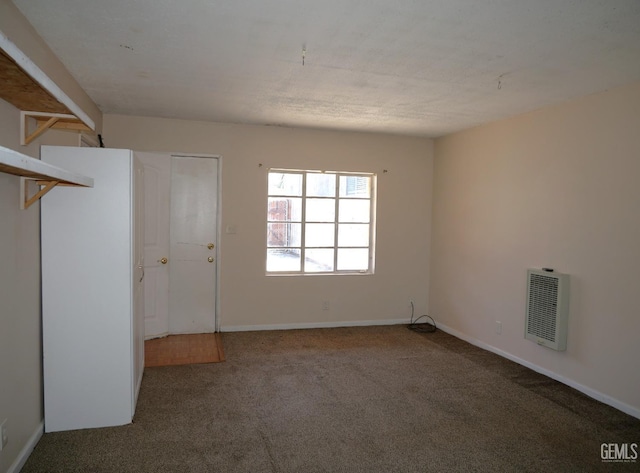101 Oakdale Dr, Bakersfield, CA 93309 - unfurnished room featuring heating unit, carpet, and baseboards